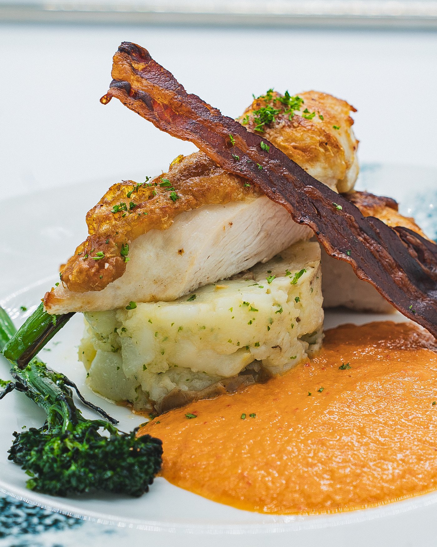 Pan-seared chicken with mojo rojo, charred broccoli and crispy pancetta