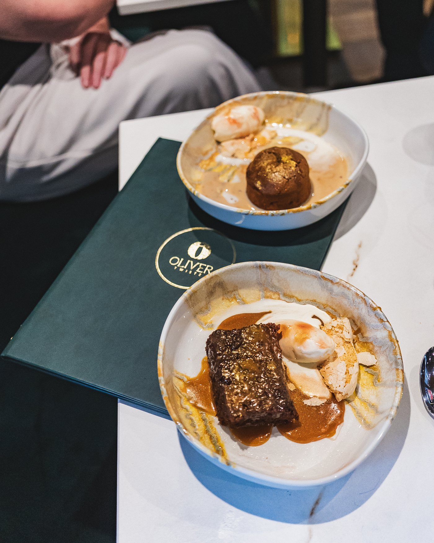 Sticky toffee pudding and a chocolate pudding with ice cream